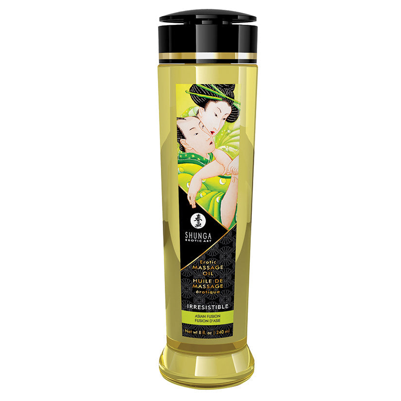 Shunga massage oil bottle with a green label and black cap on a white background