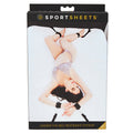 Package of Sportsheets Under the Bed Restraint System with a model on the packaging.