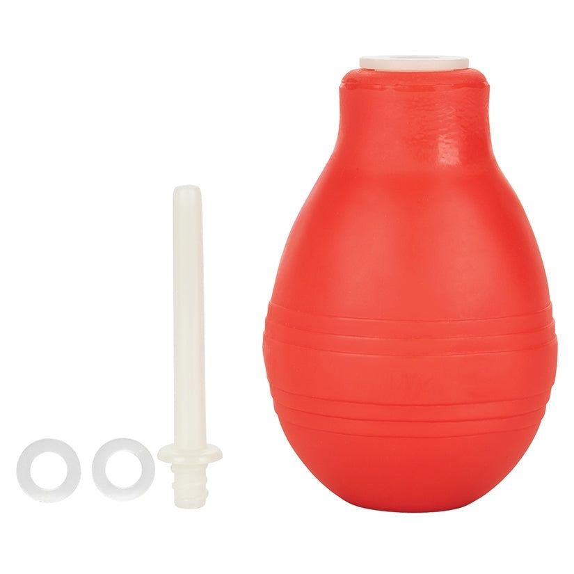 Red exercise ball with a white resistance band on a white background