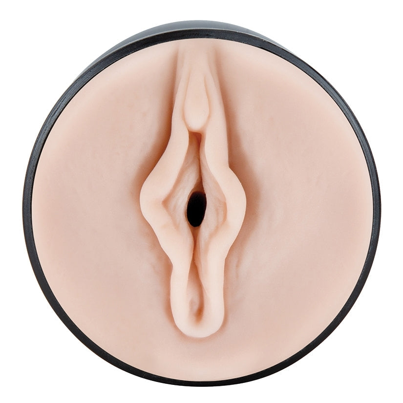Realistic silicone model of a female reproductive organ on a white background